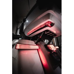 Support de déplacement de plaque d'immatriculation