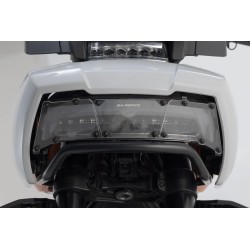 Grille de protection de phare